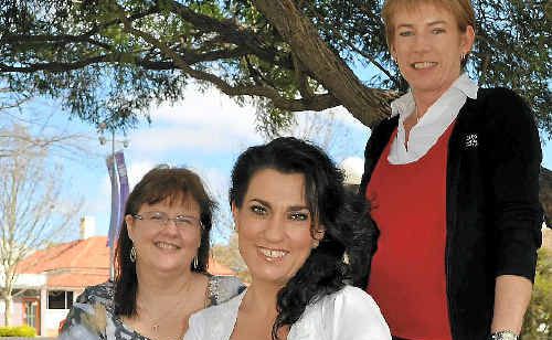 Gina Noble talks with audiometrists Sharon Jamieson and Dee Haddrill. Gina Noble talks with audiometrists Sharon Jamieson and Dee Haddrill.